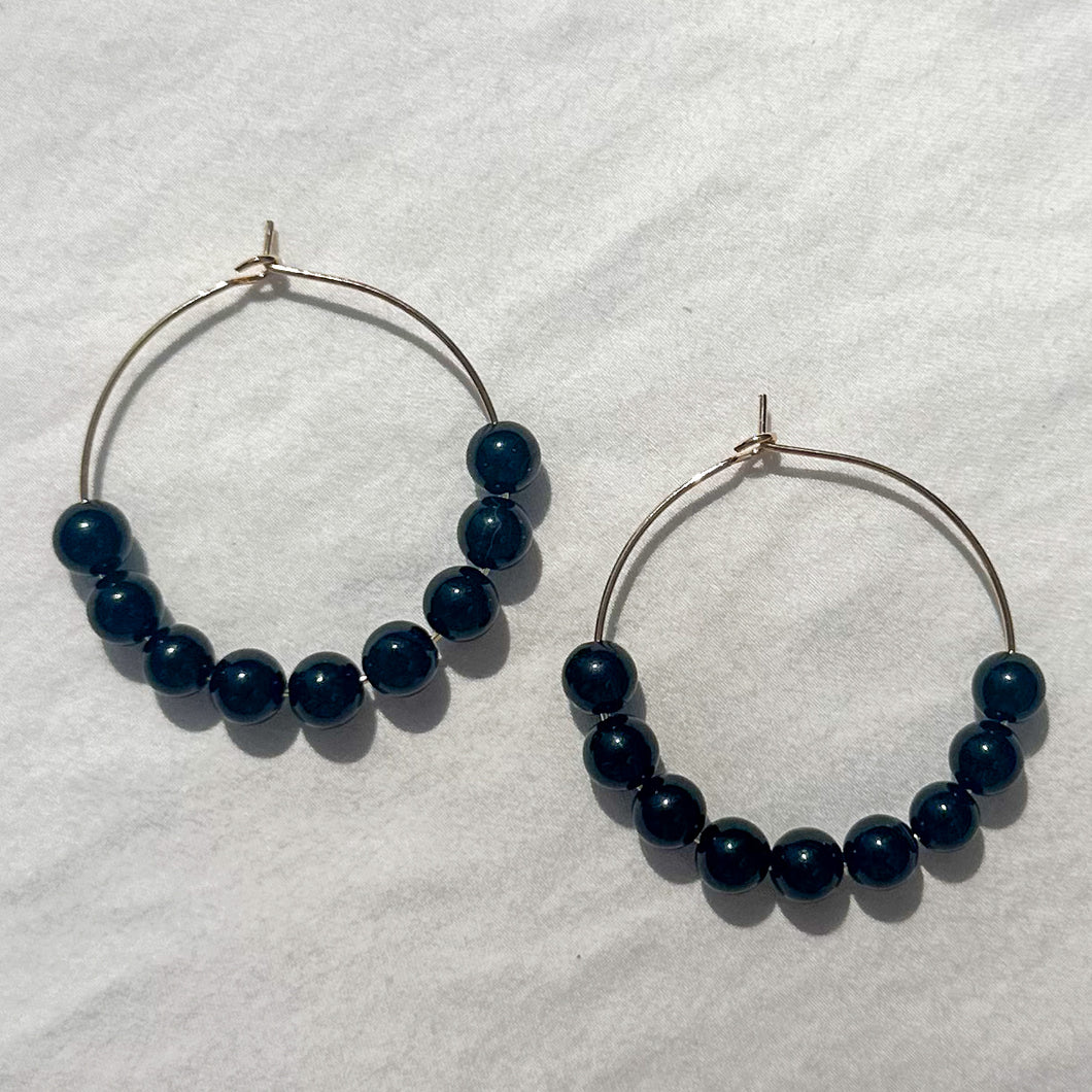 large gold-filled hoops with onyx