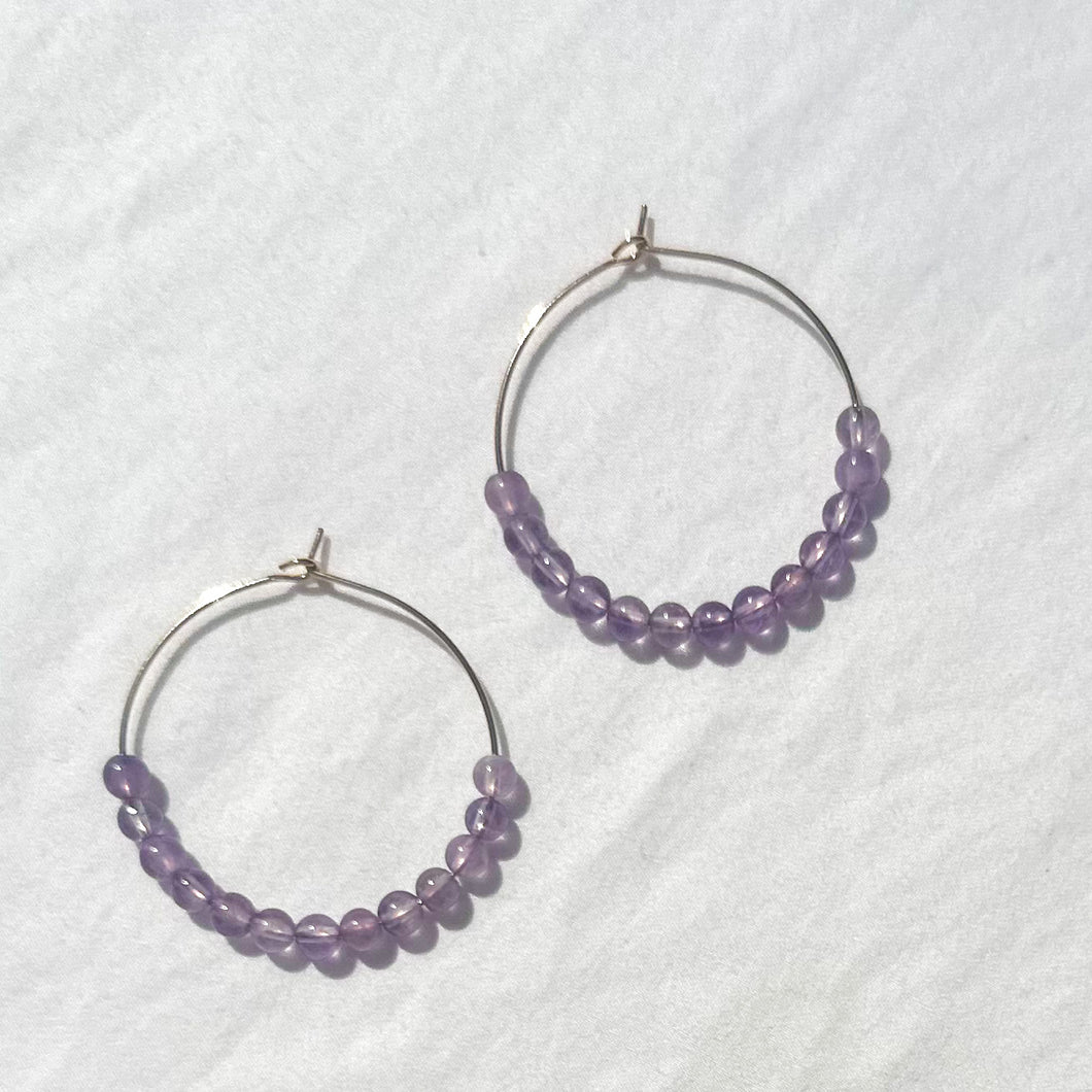 large gold-filled hoops with amethyst