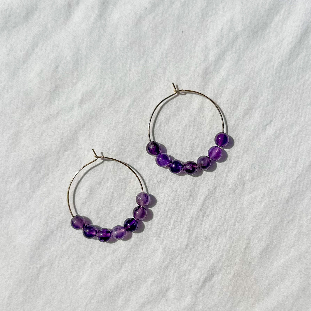 large gold-filled hoops with amethyst