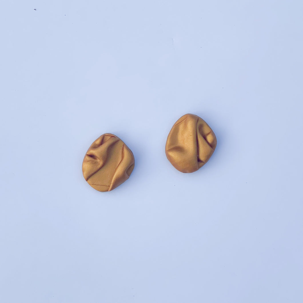 small gold draped studs